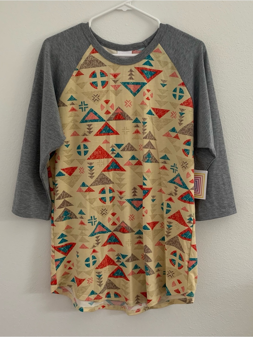 LuLaRoe Gray Raglan Top with Teal and Red Geometric Print